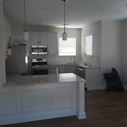 Granite Countertops and White Cabinets