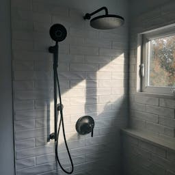 Beautiful Tiled Wall and Custom Shower Head