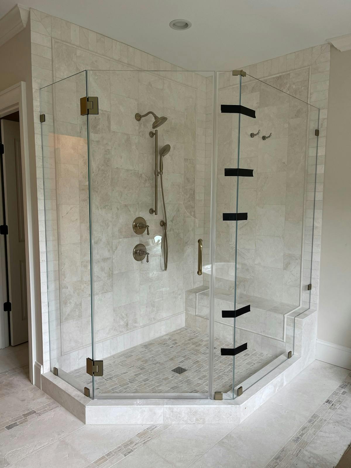 Modern Shower with Patterned Tile Floor